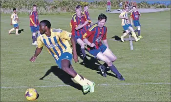  ?? 01_B32footy01 ?? No way through for Secuna Junior as the Northend defence stand firm.