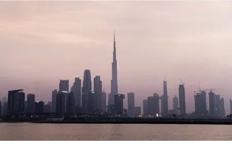  ?? Reem Mohammed / The National ?? Dubai offers internatio­nal investors relatively high yields for investment-grade properties, Savills said
