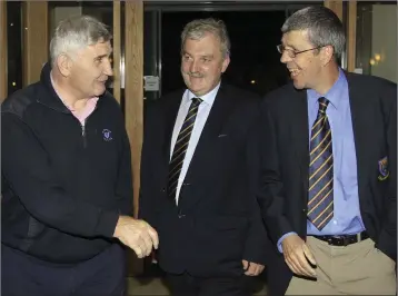  ??  ?? The then Wicklow manager Mick O’Dwyer, left, shares a joke with with Andy O’Brien, then County Board Chairman Andy O’Brien, centre, and the then county secretary Mick Murphy.