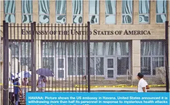  ??  ?? HAVANA: Picture shows the US embassy in Havana. United States announced it is withdrawin­g more than half its personnel in response to mysterious health attacks targeting its diplomatic staff. — AFP