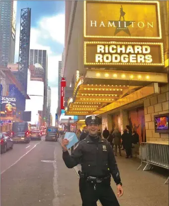  ??  ?? Officer Rick Dicandia of the Times Square Unit, NYPD, who made sure a Drogheda family got to see Hamilton.