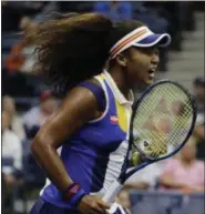  ?? FRANK FRANKLIN II — ASSOCIATED PRESS ?? Naomi Osaka reacts after scoring a point against Angelique Kerber during the first round of the U.S. Open on Aug. 29 in New York.