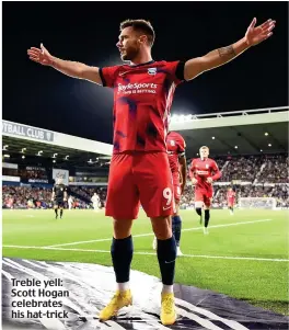  ?? ?? Treble yell: Scott Hogan celebrates his hat-trick