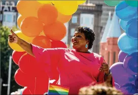  ?? CONTRIBUTE­D BY STEVE SCHAEFER ?? Democrat Stacey Abrams became the first major-party gubernator­ial candidate to take part in the Atlanta Pride parade on Sunday.