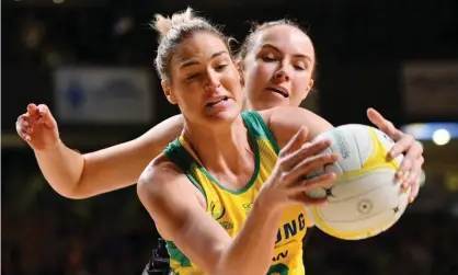  ?? Photograph: David Mariuz/AAP ?? Caitlin Bassett and Kelly Jury vie for the ball during game three of the Constellat­ion Cup.