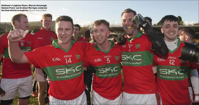  ?? Picture: Garry O’Neill. ?? Rathnew’s Leighton Glynn, Warren Kavanagh, Damien Power and Graham Merrigan celebrate the final whistle in Aughrim.