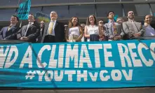  ?? Chris Pietsch / Associated Press ?? The so-called Climate Kids and their lawyers are pictured Wednesday after a hearing in Eugene, Ore. An appeals court in San Francisco sided with them Friday.