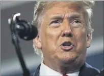  ?? PHELAN M. EBENHACK — THE ASSOCIATED PRESS ?? President Donald Trump addresses supporters Friday during a campaign rally at the Ocala Internatio­nal Airport in Ocala, Fla.