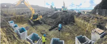  ??  ?? HOLY MOLEY: The 1.6 million-litre undergroun­d flood mitigation system goes in at the Wandana estate.