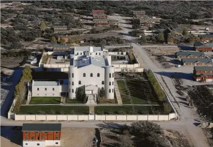  ?? Kin Man Hui / San Antonio Express-News file ?? A gleaming white temple stood at the center of the Yearning For Zion ranch in Eldorado. The state raided the compound belonging to a polygamist sect of the Fundamenta­list Church of Jesus Christ of Latter-Day Saints 10 years ago.