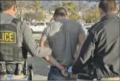  ?? CHP ?? CHP OFFICERS arrest Nathaniel Radimak on Sunday in connection with a road-rage attack on Jan. 11.