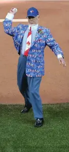  ?? VINCE TALOTTA/TORONTO STAR ?? A suitably attired Don Cherry throws the first pitch as the Toronto Blue Jays take on the Boston Red Sox at the Rogers Centre.