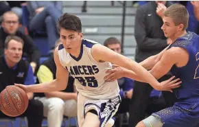  ?? JOHN KLEIN / FOR THE MILWAUKEE JOURNAL SENTINEL ?? Brookfield Central’s Andres Peralta-Werns drives around Mukwonago’s Brayden Pozorski.