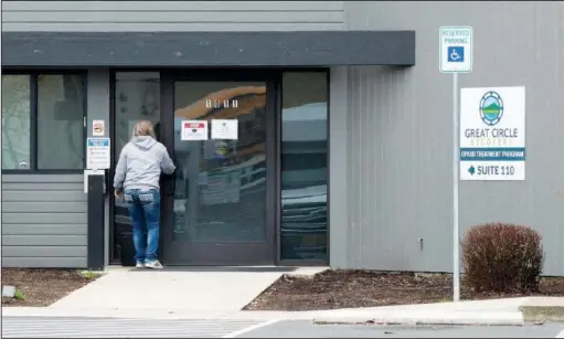  ?? (File Photo/AP/Andrew Selsky) ?? A woman enters the Great Circle drug treatment center March 8 in Salem, Ore.