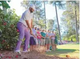  ?? ASSOCIATED PRESS ?? Scottie Scheffler hits from the pine straw on the 10th hole Saturday during the third round of the Masters at Augusta National Golf Club in Georgia.