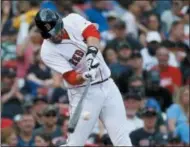  ?? MICHAEL DWYER — THE ASSOCIATED PRESS ?? Boston Red Sox’s J.D. Martinez hits a two-run home run during the fifth inning of a baseball game against the Baltimore Orioles in Boston, Sunday.