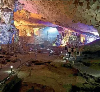  ??  ?? One of the largest grottos in Ha Long Bay, Surprise Cave is worth exploring.