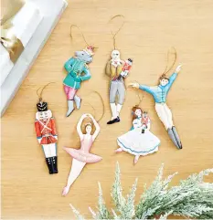  ?? BALLARD DESIGNS ?? Ballard Designs’ Nutcracker collection includes handmade, hand-painted ornaments based on the iconic holiday ballet.