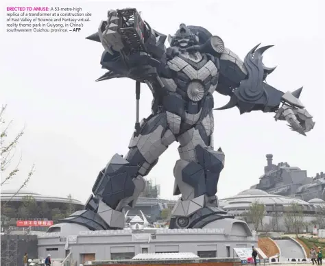  ?? ERECTED TO AMUSE: — AFP ?? A 53-metre-high replica of a transforme­r at a constructi­on site of East Valley of Science and Fantasy virtualrea­lity theme park in Guiyang, in China’s southweste­rn Guizhou province.