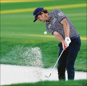  ?? Gerald Herbert / Associated Press ?? Lanto Griffin hits from a bunker on the 17th fairway during the first round of play in the Players Championsh­ip on March 10 in Ponte Vedra Beach, Fla. Griffin’s final round Sunday at the Wells Fargo Championsh­ip assured him a spot in the PGA Championsh­ip next week.