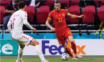  ??  ?? Gareth Bale in action in Euro 2020. If he plays all Wales’s games in their forthcomin­g triple-header, he will reach 99 caps. Photograph: Eurasia Sport Images/Getty Images