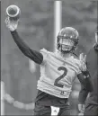  ?? CP PHOTO ?? Johnny Manziel (2) is seen on the field at McMaster University during Tiger Cats training camp in Hamilton, Ont., on Sunday.