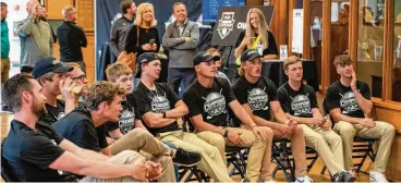  ?? CONTRIBUTE­D ?? The Wright State men’s golf team watches the Division I NCAA Tournament selection show Wednesday afternoon. The Horizon League-champion Raiders will play in the Columbus Regional at Ohio State.