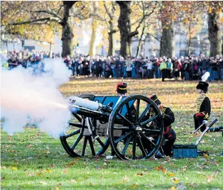  ?? Pictures: TIM ROOKE, AFP/CROWN COPYRIGHT, MARK STEWART ?? Army gunners fire a salute watched by a big crowd in Green Park, central London