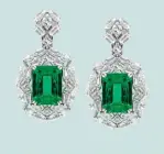  ??  ?? Earrings with 24.40ct Colombian emeralds