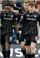  ??  ?? DEADLY DUO: Pars goalscorer­s Afolabi (left) and Nisbet (right)