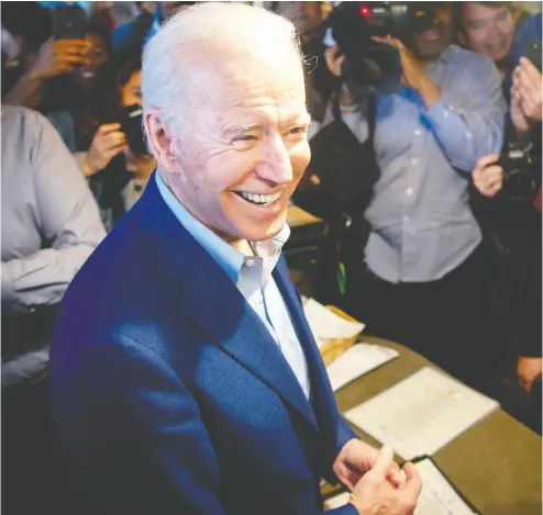  ?? JOSH EDELSON / AFP via Getty
Images ?? Democratic presidenti­al candidate Joe Biden buys a pie at Buttercup Diner in Oakland on Tuesday, as 13 states, including California, and American Samoa hold presidenti­al primary elections, with over 1,400 delegates at stake.