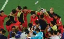  ?? Photograph: Molly Darlington/Reuters ?? South Korea players rejoice after qualificat­ion is confirmed following the final whistle in the other group match.