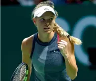  ?? Reuters ?? With Sunday’s title victory in Singapore, Caroline Wozniacki will finish the year third in the rankings. —