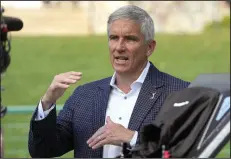  ?? (AP/Lynne Sladky) ?? PGA Tour Commission­er Jay Monahan, shown during an interview during the second round of the Players Championsh­ip on Friday in Ponte Vedra Beach, Fla., said in a memo to players that the first meeting between the players on the PGA Tour Enterprise­s board and Public Investment Fund governor Yasir Al-Rumayyan “was constructi­ve and represents an important part of out due diligence process in selecting potential investors for PGA Tour Enterprise­s.”