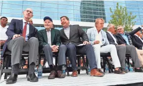  ?? MICHAEL SEARS / MILWAUKEE JOURNAL SENTINEL ?? From left, Adam Silver, commission­er of the NBA; former Bucks owner Herb Kohl; Bucks President Peter Feigin; and Bucks owners Wes Edens, Marc Lasry and Jamie Dinan are seated as the Fiserv Forum opening ceremony gets underway.