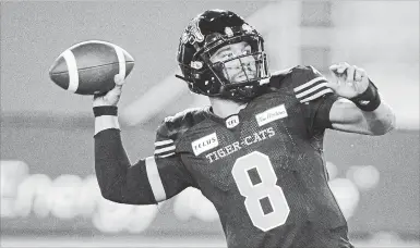  ?? PETER POWER THE CANADIAN PRESS FILE PHOTO ?? QB Jeremiah Masoli leads the Hamilton Tiger-Cats. Hamilton is leading the CFL in net yards this season at 447.5 per game.