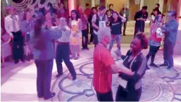  ??  ?? Passengers on cruise ship Diamond Princess dance on the dance floor, at the sea, February 2, in this screenshot obtained from social media video. (Philip And Gay Courter via Reuters)