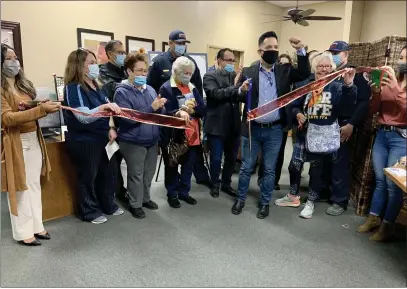  ?? ROBYN DOBSON/DAILY DEMOCRAT ?? Supervisor Angel Barajas cuts a ceremonial ribbon to celebrate the opening of a new satellite office for residents of District 5 in Esparto on Thursday, Nov. 4. The office will serve as a place to connect rural residents with the rest of Yolo County.