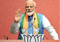  ?? — AFP ?? Prime Minister Modi speaks after releasing the Bharatiya Janata Party’s manifesto ahead of country’s upcoming general elections in New Delhi.