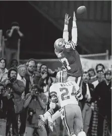 ?? John Storey / San Francisco Examiner / Bancroft Library 1982 ?? Dwight Clark’s classic “The Catch,” on Jan. 10, 1982, at Candlestic­k Park, burns strongly in readers’ memories.