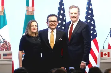  ??  ?? File photo of Canadian Foreign Minister Chrystia Freeland, Mexican Economy Minister Ildefonso Guajardo and US Trade Representa­tive Robert Lighthizer pose during a joint news conference on the closing of the seventh round of NAFTA talks in Mexico City,...