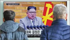  ?? /AP AHN YOUNG-JOON ?? People watch North Korean leader Kim Jong Un’s New Year’s speech at Seoul Railway Station in Seoul, South Korea.