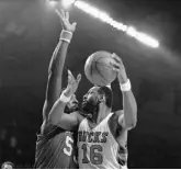  ?? Associated Press file ?? Milwaukee’s Bob Lanier moves for the basket against Philadelph­ia’s Darryl Dawkins in 1981.