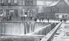  ??  ?? A historic photo of Campbeltow­n flooding.