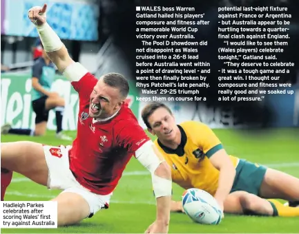  ??  ?? Hadleigh Parkes celebrates after scoring Wales’ first try against Australia