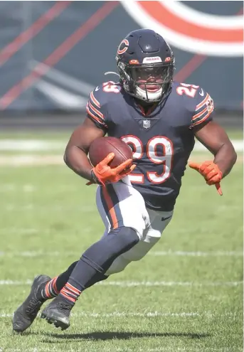  ?? KAMIL KRZACZYNSK­I/AP ?? Tarik Cohen signed a three-year, $17.3 million contract that includes $9.53 million guaranteed.