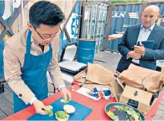  ??  ?? Making a meal of it: candidate Jeff attempts to sell burgers in the reality TV show