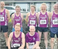  ?? ?? The men’s teams, at the county masters championsh­ips last Sunday.