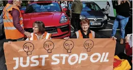  ?? Pictures: ISABEL INFANTES/AFP, TOM BOWLES/STORY PICTURE AGENCY ?? No entry...protesters stop traffic in London’s Park Lane yesterday