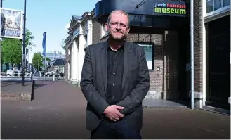  ?? (Cnaan Liphshiz) ?? JEWISH CULTURAL QUARTER director Emile Schrijver stands in the quarter’s central Amsterdam location earlier this month.